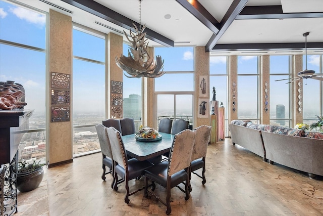 dining space featuring beamed ceiling, ceiling fan, and floor to ceiling windows