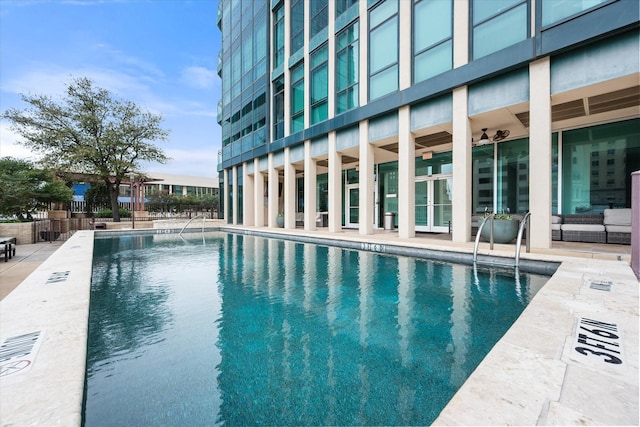 view of swimming pool featuring a patio