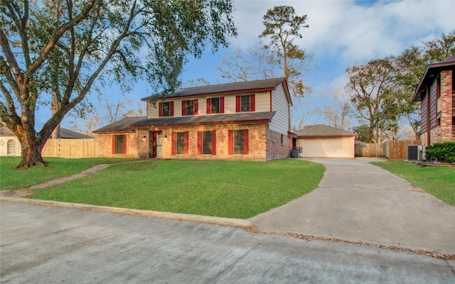 view of front of home with an outbuilding, a garage, central AC, and a front lawn