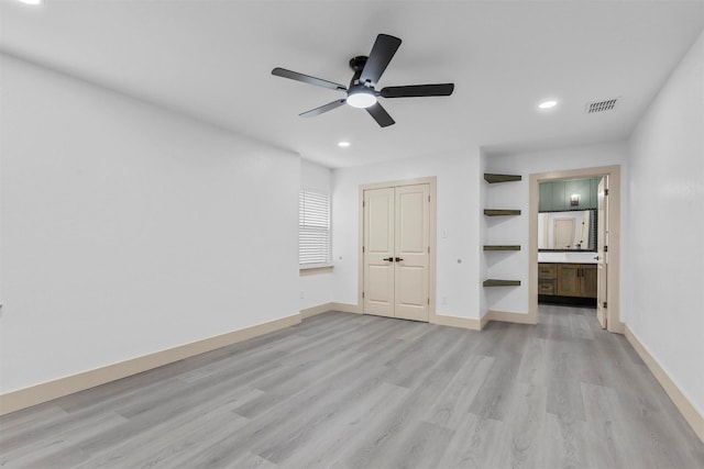 unfurnished bedroom with light wood-style flooring, recessed lighting, visible vents, and baseboards