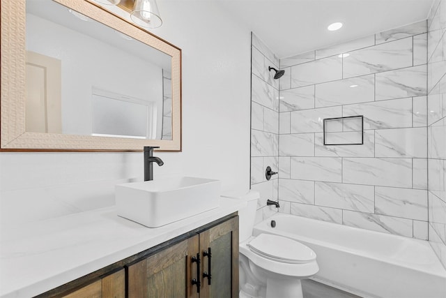 full bathroom featuring shower / bath combination, vanity, and toilet