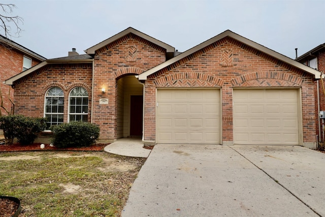 view of front of property with a garage