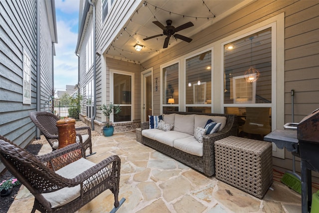 view of patio with ceiling fan and outdoor lounge area