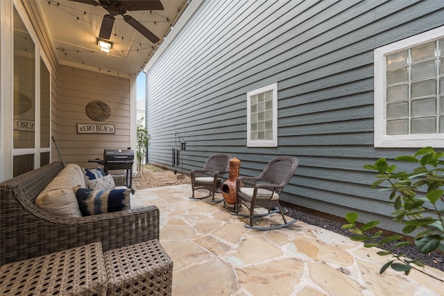 view of patio / terrace featuring area for grilling and ceiling fan