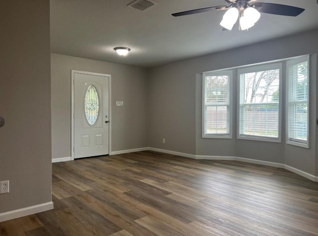 entrance foyer featuring ceiling fan and dark hardwood / wood-style flooring