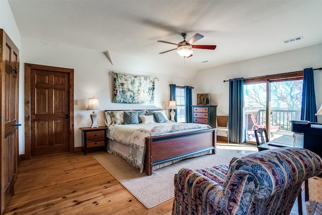 505 Mccormick Rd, Oak Point, TX 75068 - bedroom with access to exterior, hardwood / wood-style flooring, and ceiling fan