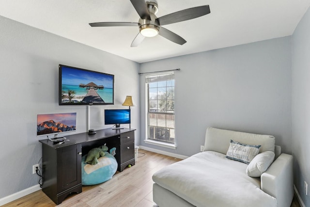 interior space with ceiling fan and light wood-type flooring