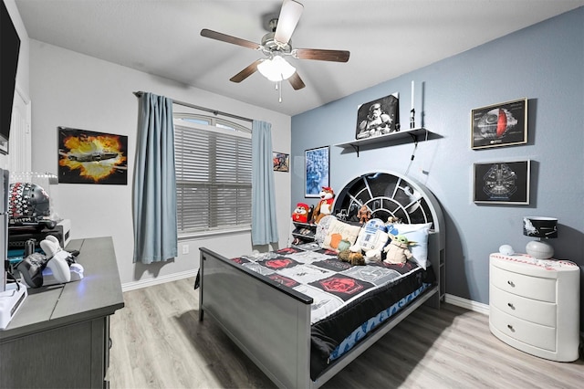 bedroom featuring ceiling fan and light hardwood / wood-style floors