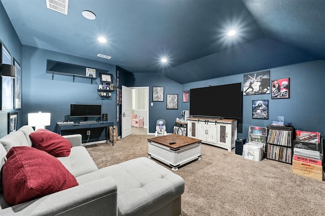 carpeted living room with vaulted ceiling