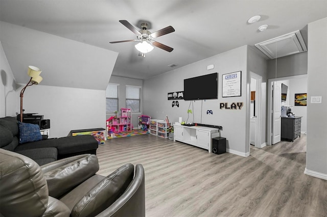 game room with ceiling fan and light hardwood / wood-style flooring