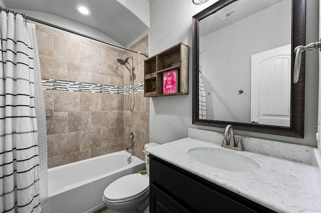 full bathroom with vanity, toilet, and shower / bath combo with shower curtain