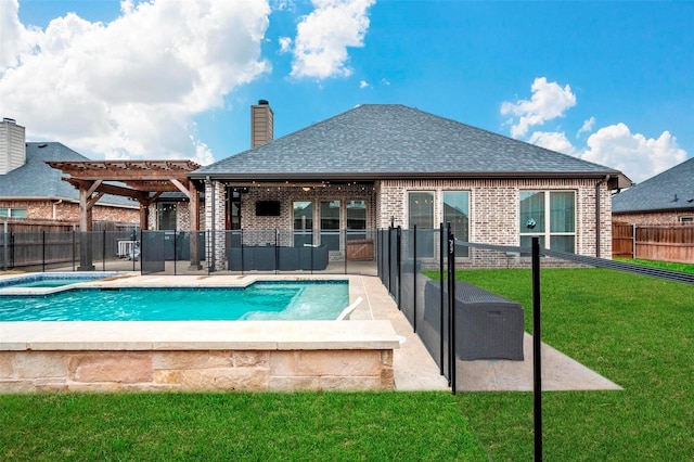 view of pool featuring a patio, a pergola, and a lawn