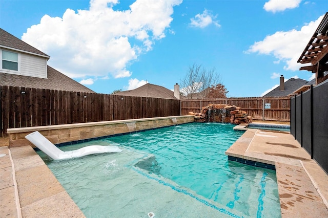 view of pool featuring pool water feature