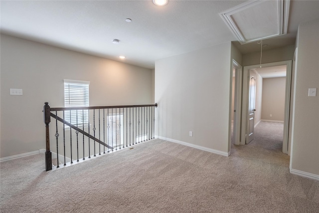 1267 Jones Trl, Lewisville, TX 75077 - hallway featuring attic access, carpet flooring, baseboards, and recessed lighting