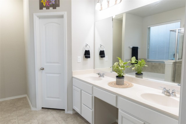 bathroom featuring tile patterned floors and vanity