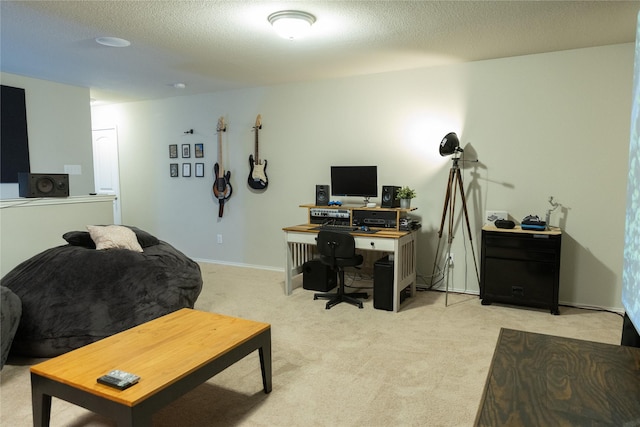 carpeted home office with a textured ceiling