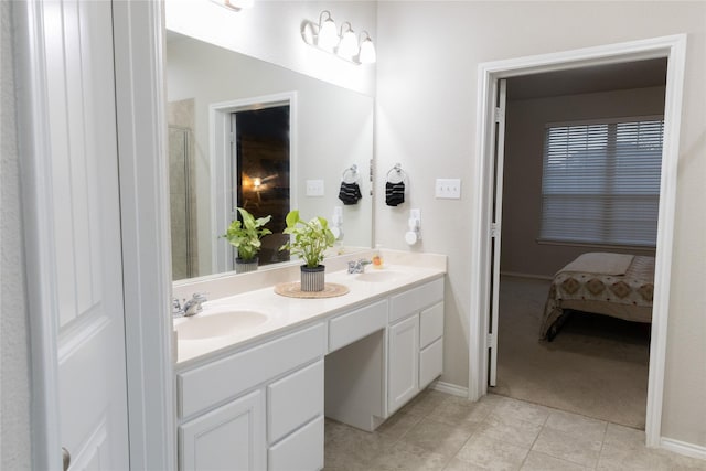 bathroom with vanity and tile patterned floors