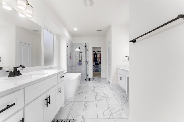 bathroom with vanity and plus walk in shower