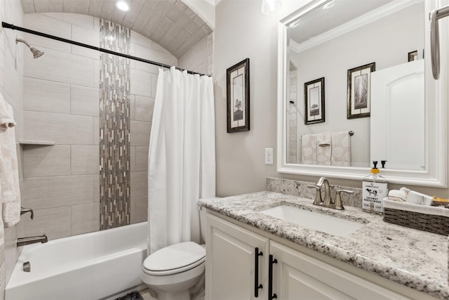 full bathroom featuring crown molding, toilet, shower / tub combo, vaulted ceiling, and vanity