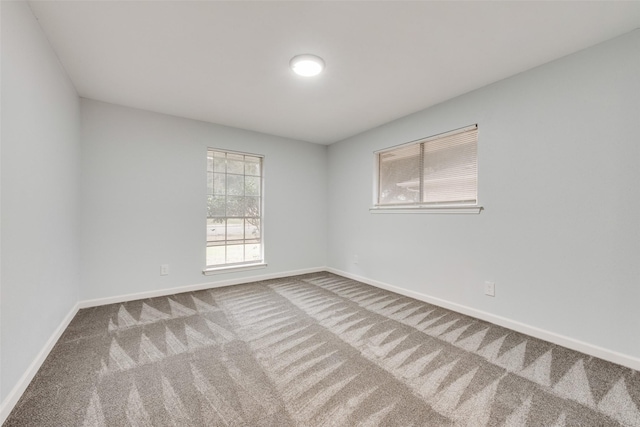 view of carpeted spare room