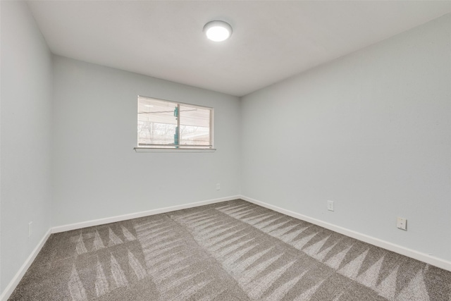 spare room with carpet flooring