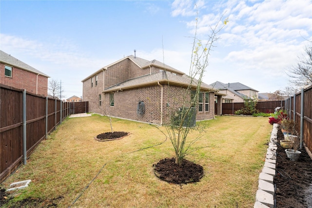 view of yard featuring a fenced backyard