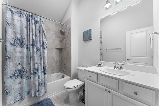 bathroom featuring shower / tub combo with curtain, toilet, vanity, a textured ceiling, and tile patterned flooring