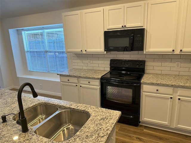 kitchen featuring white cabinetry, dark hardwood / wood-style floors, sink, and black appliances