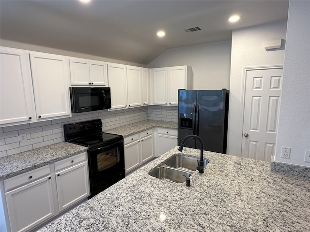 kitchen featuring white cabinetry, sink, tasteful backsplash, and black appliances