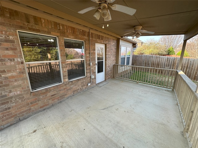 view of patio featuring ceiling fan