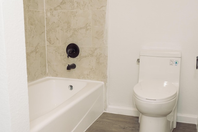 bathroom with wood-type flooring and toilet