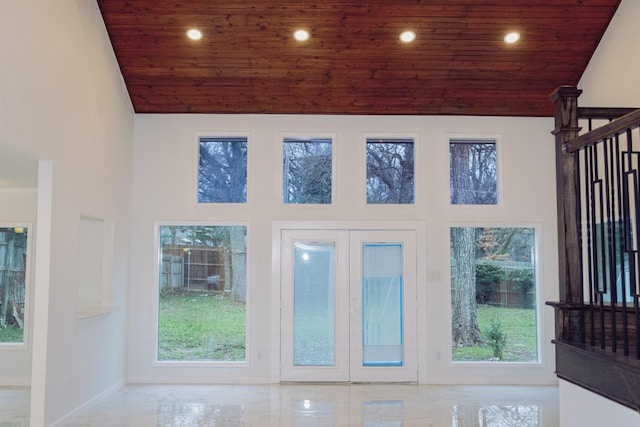 entryway featuring high vaulted ceiling and wooden ceiling