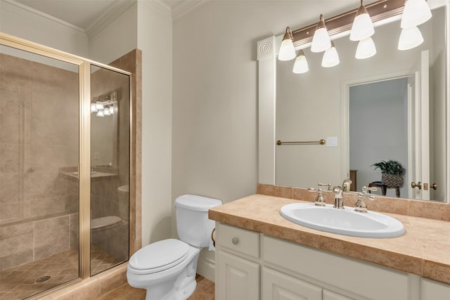 bathroom featuring crown molding, vanity, toilet, and a shower with shower door