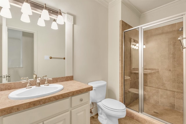 bathroom featuring vanity, ornamental molding, toilet, and walk in shower