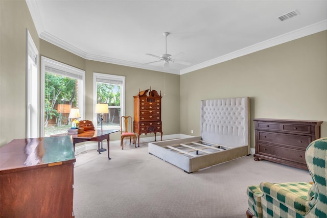 bedroom with crown molding, light carpet, and ceiling fan