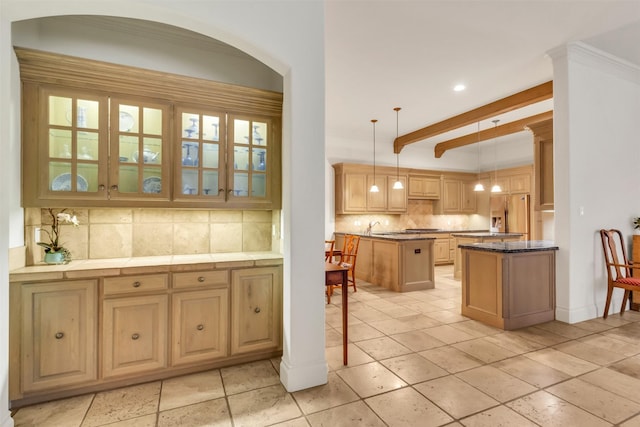 kitchen featuring a center island, stainless steel refrigerator with ice dispenser, tasteful backsplash, decorative light fixtures, and light brown cabinets