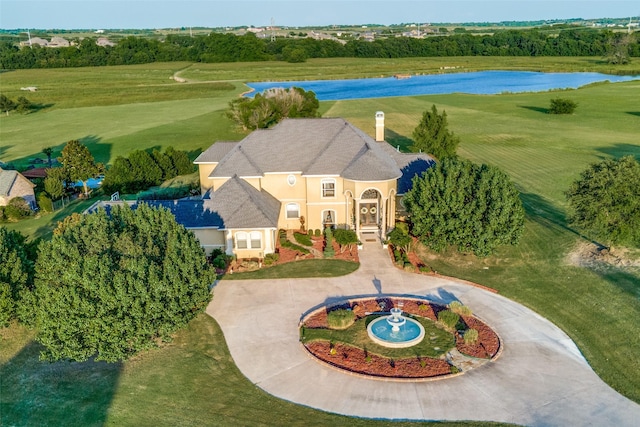 bird's eye view with a water view