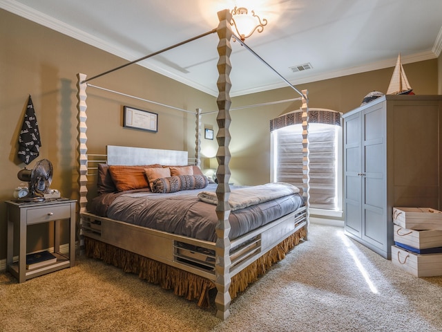 carpeted bedroom featuring crown molding