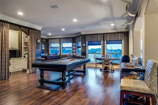 game room featuring dark hardwood / wood-style flooring, ornamental molding, and billiards