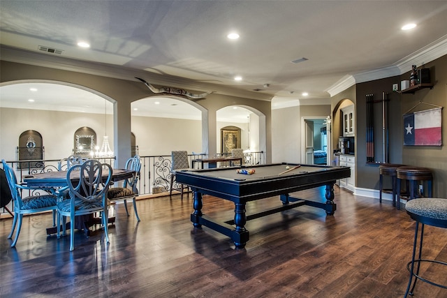 recreation room with ornamental molding, dark hardwood / wood-style floors, and billiards