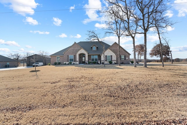 view of front of house with a front yard