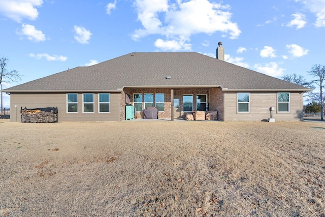 back of house with a patio area