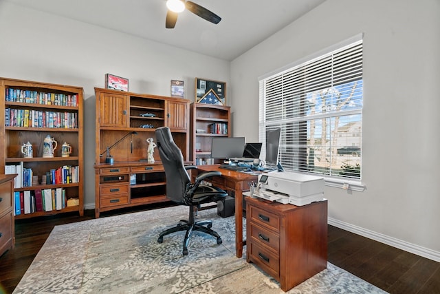 office with dark wood-type flooring and ceiling fan