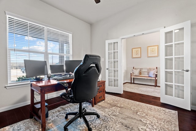 office area with french doors, ceiling fan, and dark hardwood / wood-style flooring