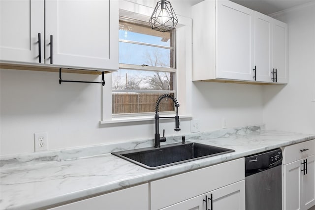 kitchen featuring sink, light stone counters, hanging light fixtures, stainless steel dishwasher, and white cabinets