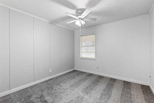 carpeted empty room featuring ornamental molding and ceiling fan