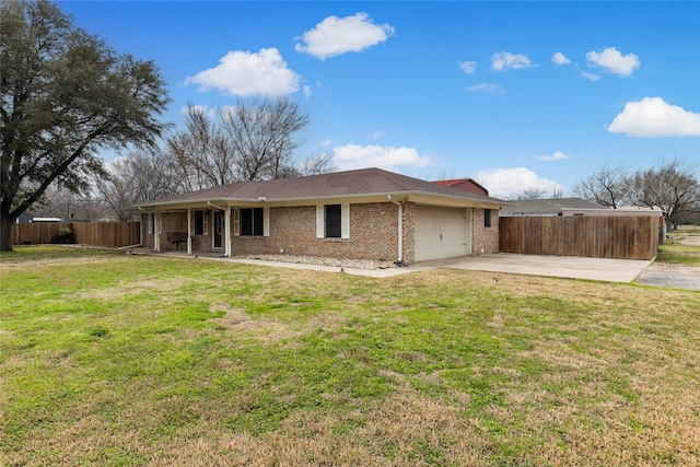 exterior space featuring a yard and a garage