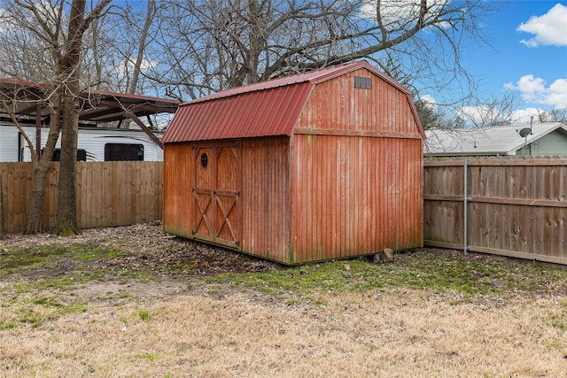 view of outbuilding with a lawn