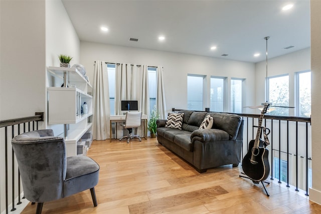 living room with light hardwood / wood-style floors