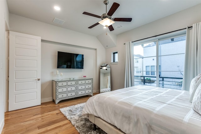 bedroom with ceiling fan and light hardwood / wood-style floors